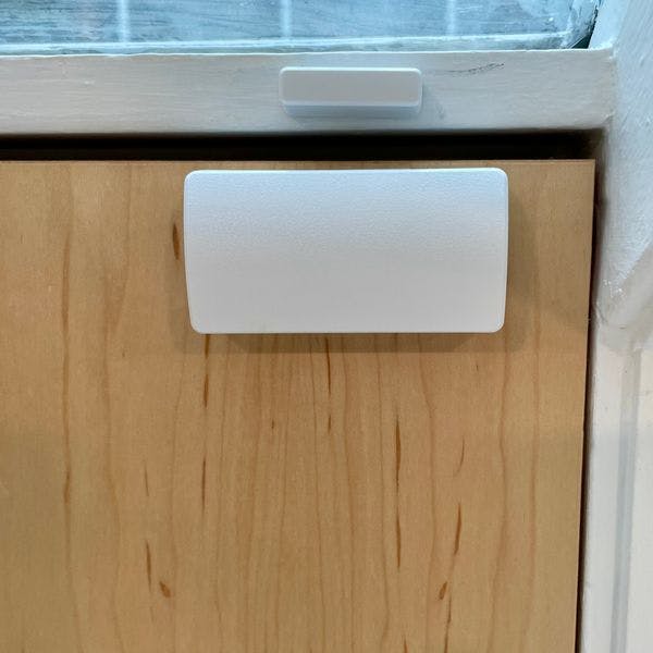 ADT door/window sensor installed to door and frame